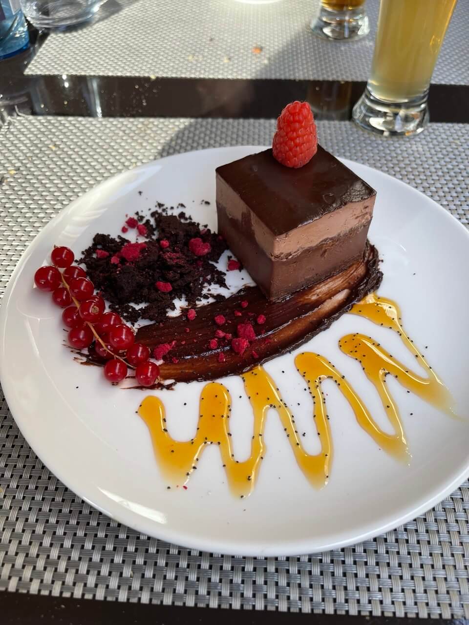 delicious looking chocolate cake with mango sauce
